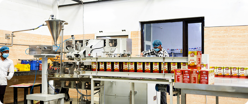 Filtered and cooled ghee is packed in glass jars and tins in a clean environment to preserve freshness and purity.